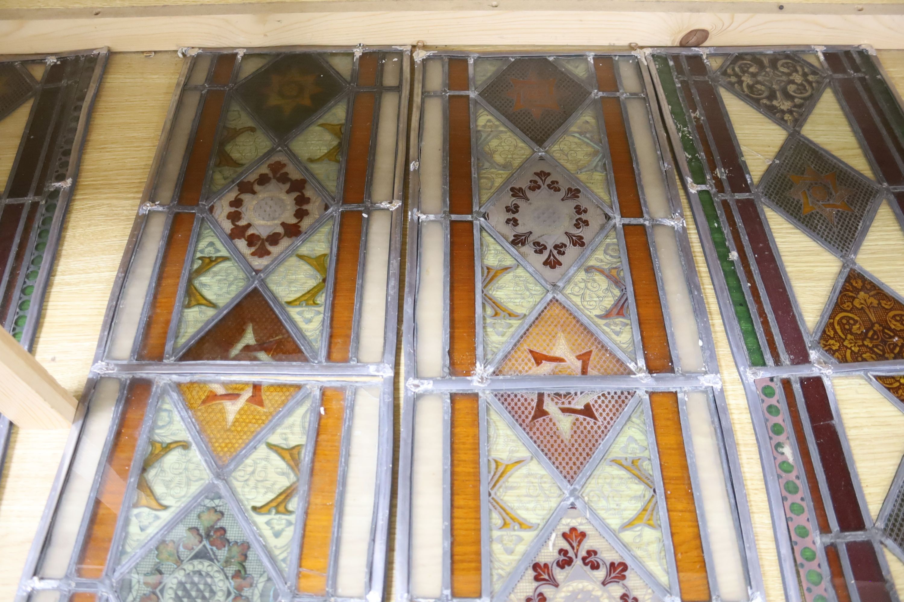 Four late 19th century stained and lead glass panels, 81 x 27cm